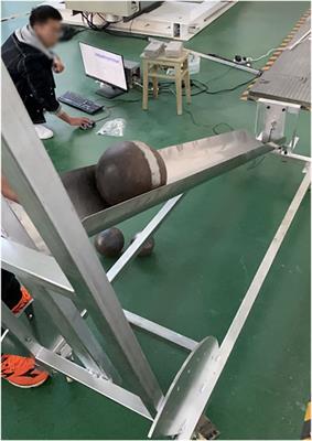 Dynamic responses of 500-kV transmission line towers under impact force of rockfall in a mountainous area